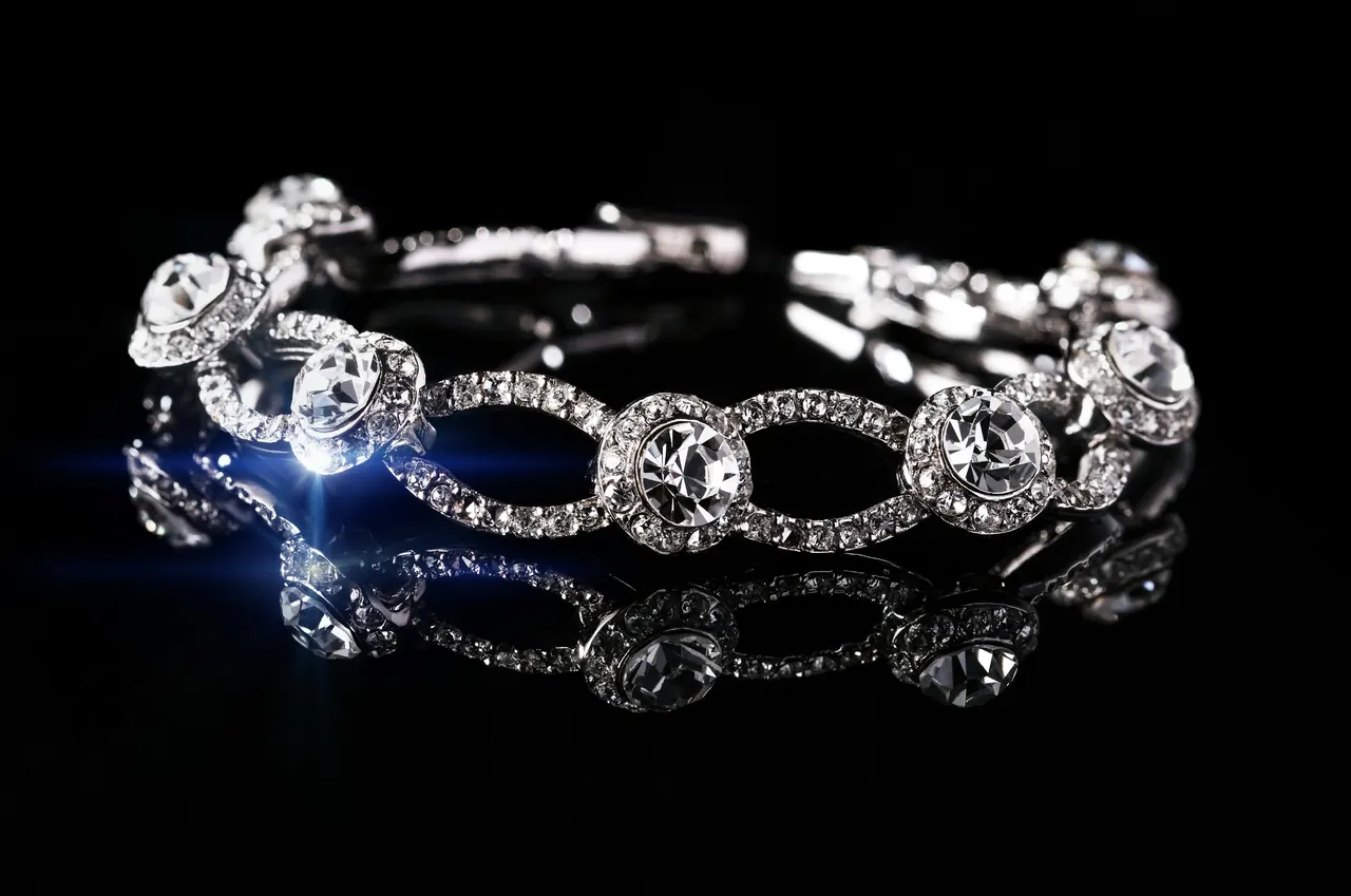 A diamond jewellery piece on a black surface